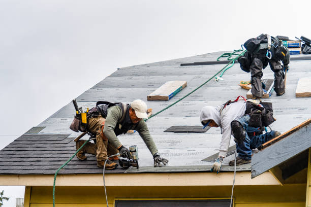 Professional Storm Damage Roof Repair technician working in Midland, NC